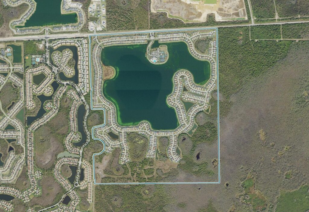 Aerial view of Corkscrew Shores, Estero, FL, with the community boundary outlined
