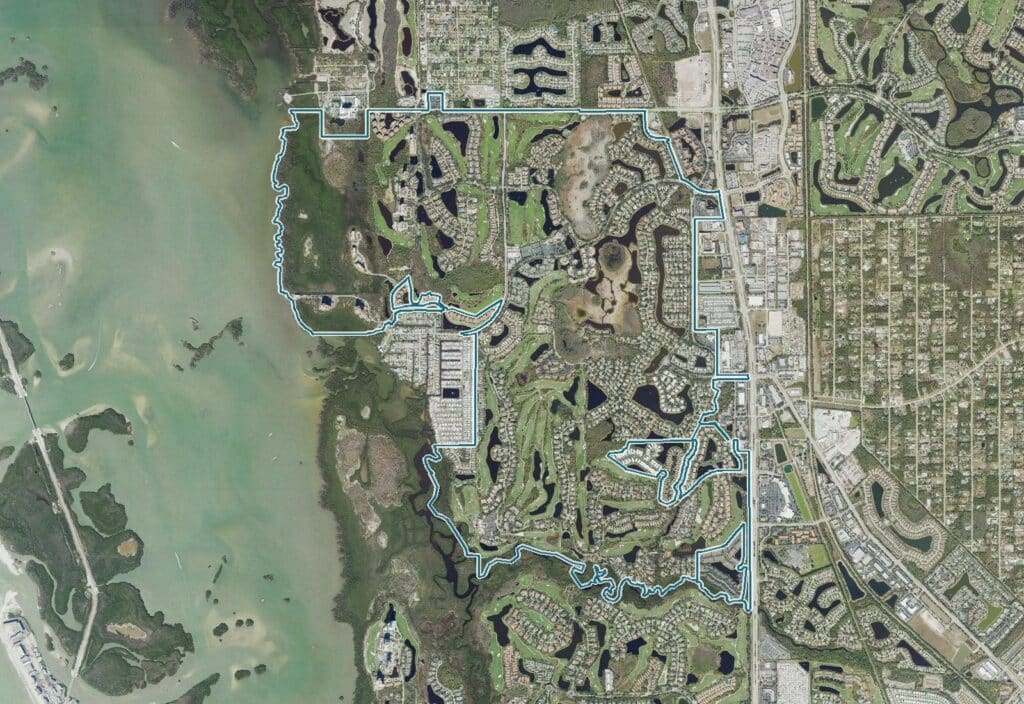 Aerial view of Pelican Landing, Bonita Springs, FL, with the community boundary outlined